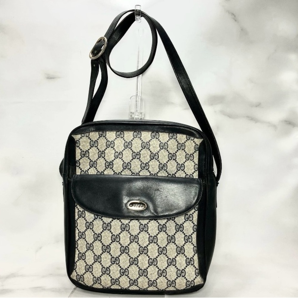 **SOLD**One of the strap tore needs repair.  Gucci vintage